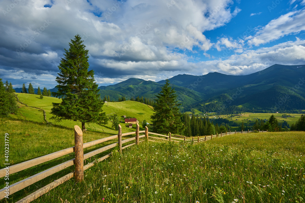 wooden fence in mountains