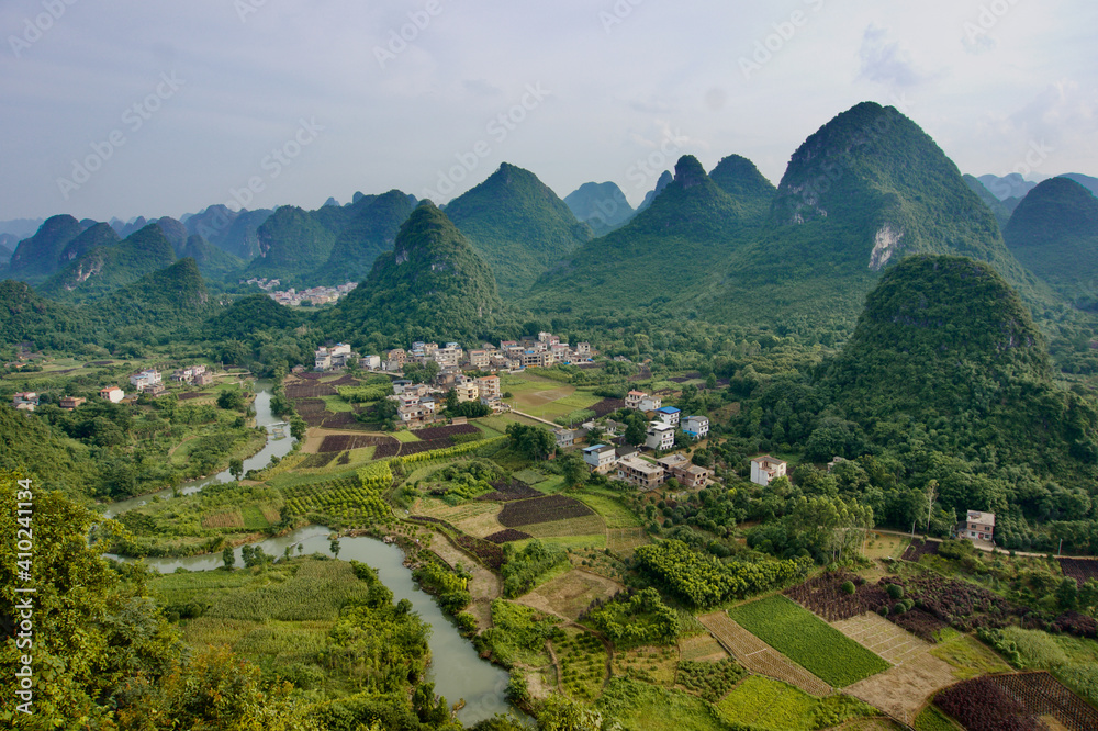 Sunset landscape of Guilin, Li River and Karst mountains. Located near Yangshuo County, Guilin City, Guangxi Province, China.