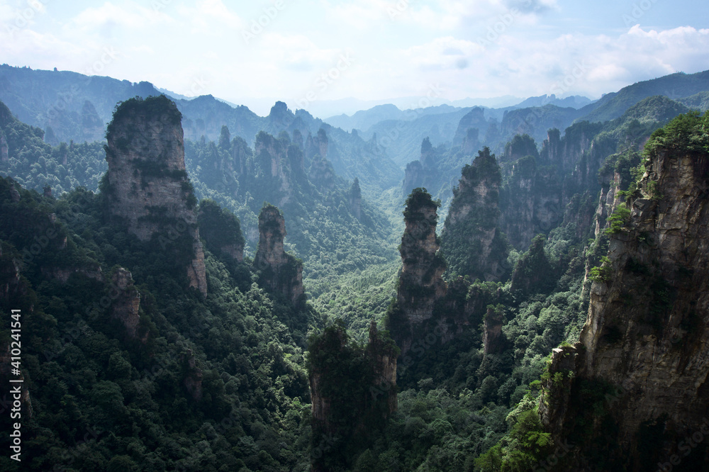 Zhangjiajie Cliff Mountains - National Forest Park Landscape in China.  Dark Avatar Mountains. Mysterious and gloomy cliffs. 