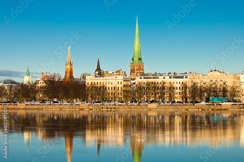 riga. in the photo, a panorama of the city against the blue sky © fotofotofoto