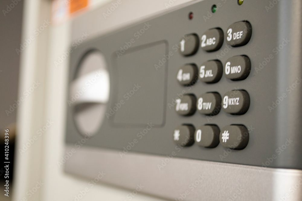Safe lock code password pad number protection safety box bank close up Safe lock code password pad number protection safety box bank close up