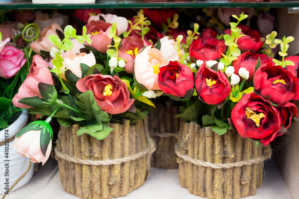 Artificial decorative flowers available for sale. Bright and beautiful colors of plastic flowers