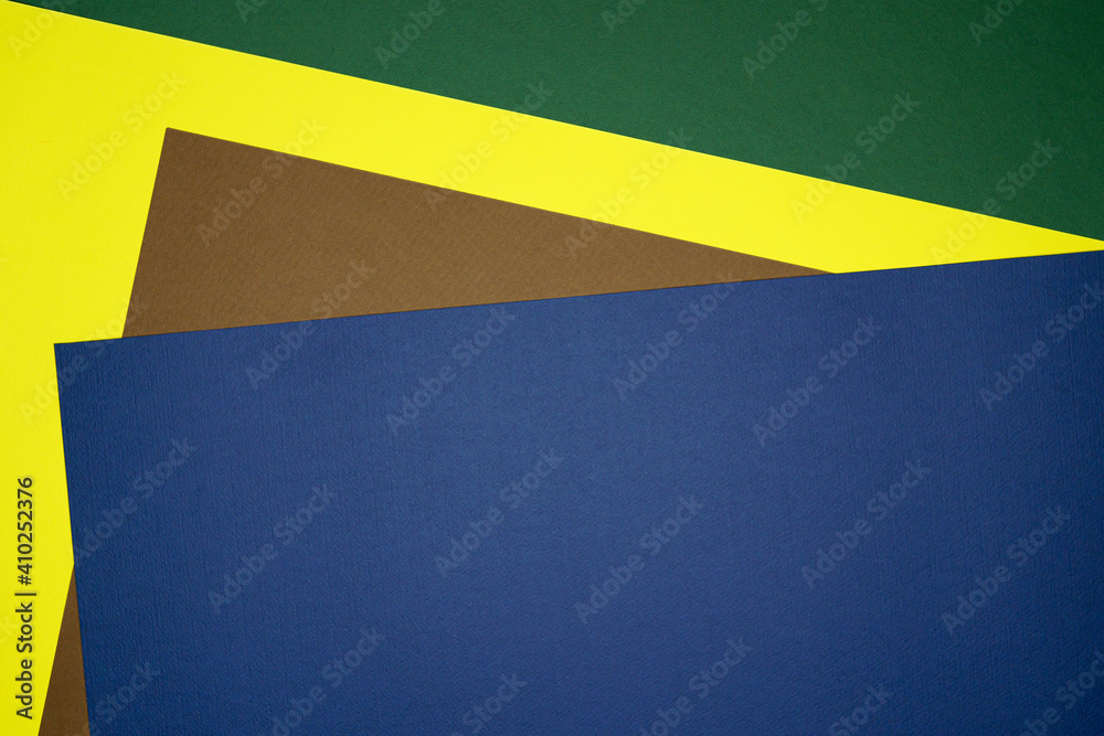 Brown, yellow, green, blue four tone color paper background with stripes. Abstract background modern hipster futuristic. Texture design Brown, yellow, green, blue four tone color paper background with stripes. Abstract background modern hipster futuristic. Texture design