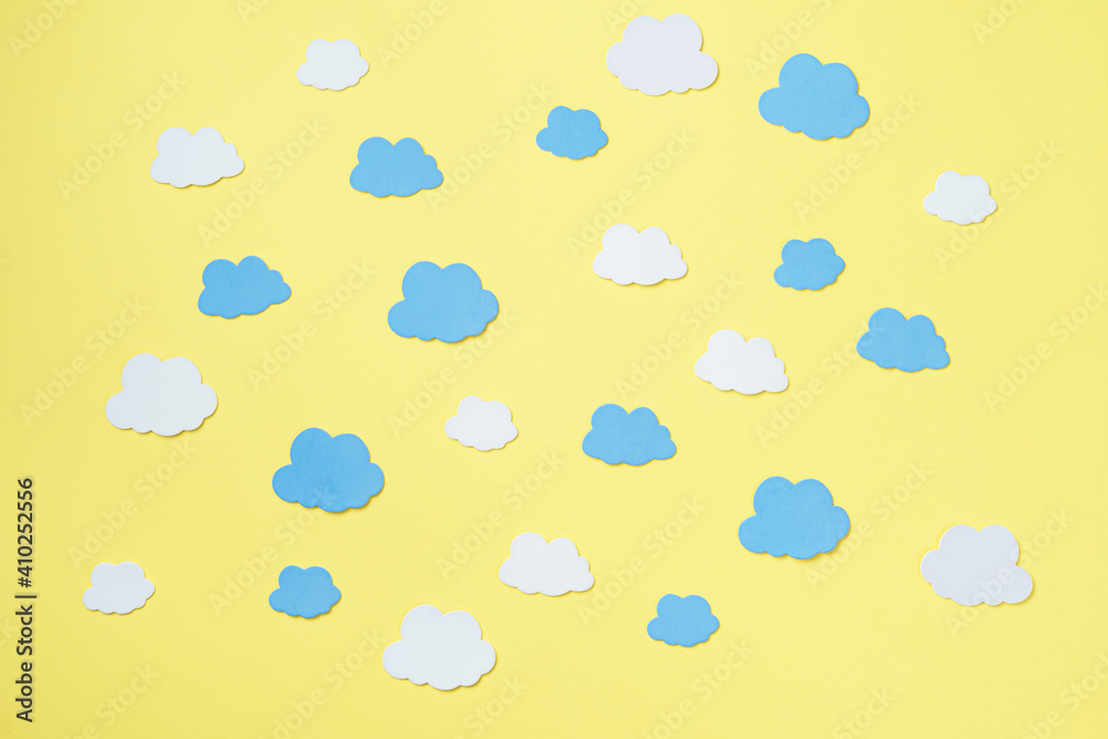 Elements in shape of clouds surrounding yellow background with space for text on orange background. Mockup, copy space