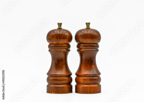 salt and pepper mill, wooden cruet set white background full depth of field