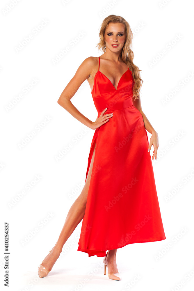 Young beautiful happy blonde woman in red dress