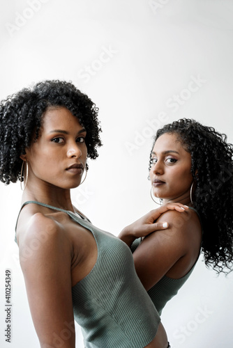 Two beautiful african women opposite each other portrait