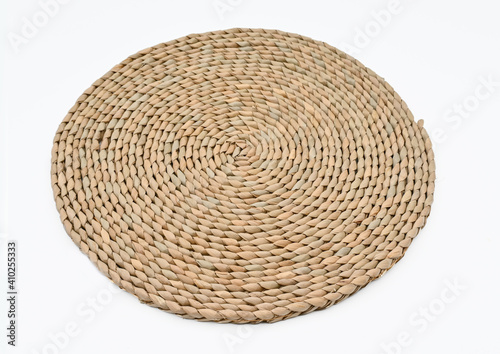 vintage cane table mat with isolated white back ground full depth of field