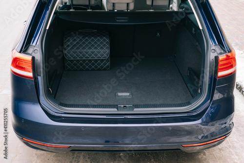 Car trunk. Open trunk. Seat of the second row of seats. Organizer in the trunk.