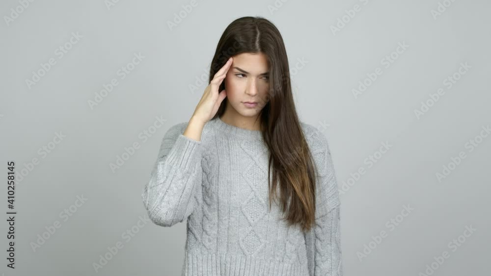 Teenager Brazilian girl unhappy and frustrated with something over isolated background Teenager Brazilian girl unhappy and frustrated with something over isolated background