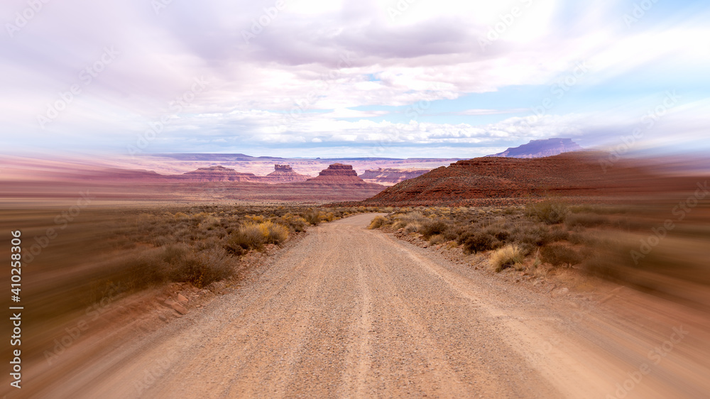Rural desert dirt road with motion blur in Utah.