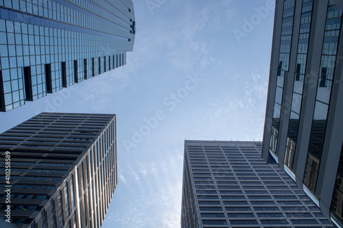 Four skyscrapers with a blue sky  concept of business growth