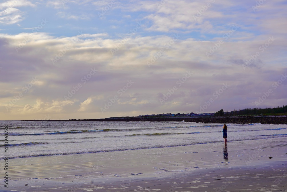 Lone figure on a Connemara beach