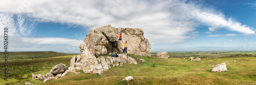 Two young men bouldering at Plumstone Mountain