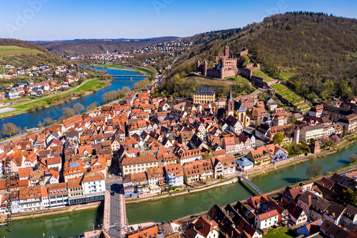 Germany, Baden-Wurttemberg, Wertheim am Main, Helicopter view of town located on confluence of rivers Tauber and Main in summer photo