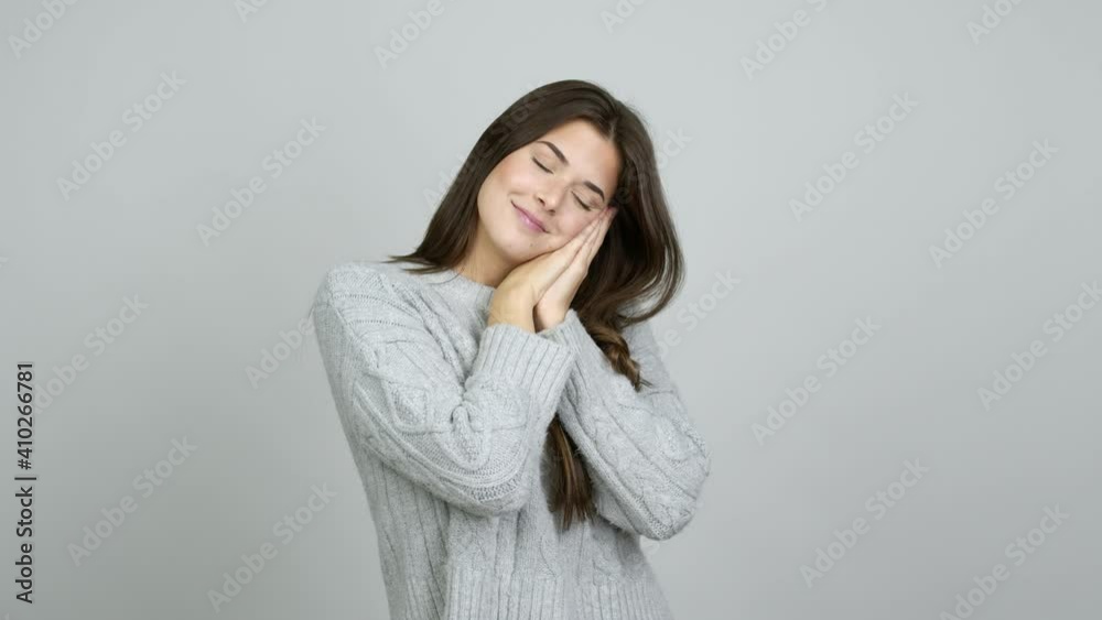 Teenager Brazilian girl making sleep gesture. Adorable and sweet expression over isolated background Teenager Brazilian girl making sleep gesture. Adorable and sweet expression over isolated background
