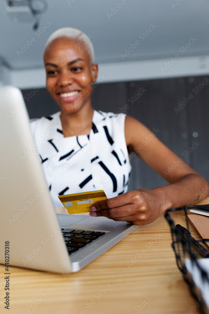 Spain Barcelona, african american woman working at office, mpdern african-american working female alone barcelona casual-office Spain Barcelona, african american woman working at office, mpdern african-american working female alone barcelona casual-office