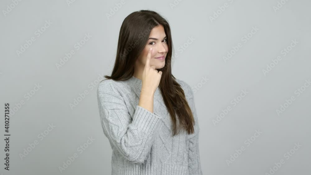 Teenager Brazilian girl looking front over isolated background Teenager Brazilian girl looking front over isolated background