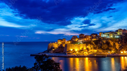 Ulcinj montenegro at night old town skyline sea view.