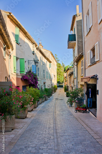 Fototapeta Naklejka Na Ścianę i Meble -  Saint Tropez, Old city street view with colorful houses, Côte d'Azur. France, Europe