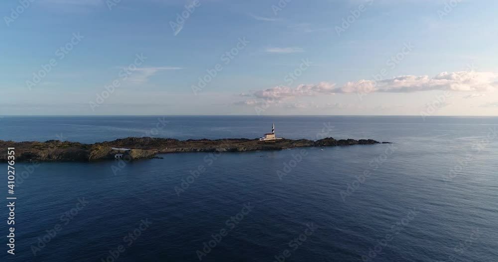 Menorca lighthouse with the Mediterranean Sea in the background - Aerial view with a drone 4K Menorca lighthouse with the Mediterranean Sea in the background - Aerial view with a drone 4K