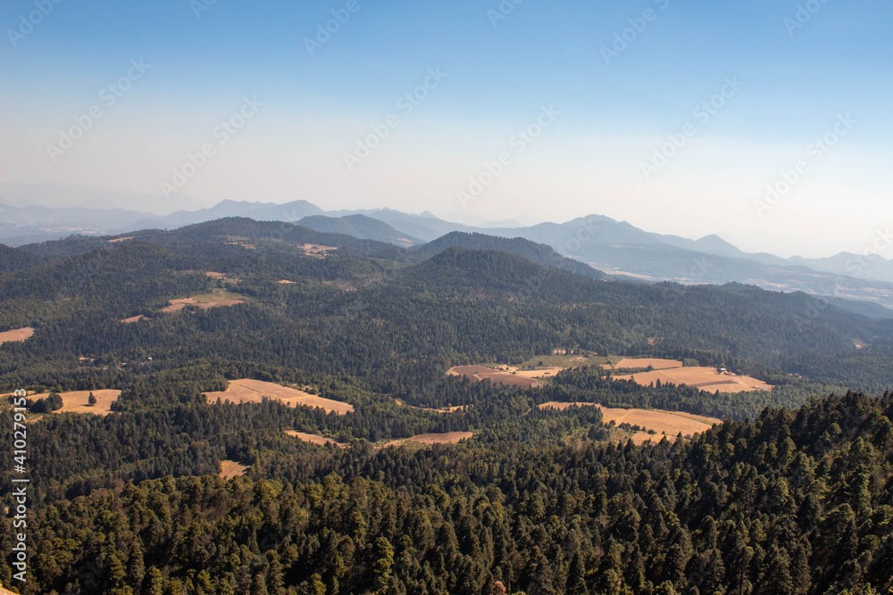 Naklejka premium Overlooking the fields from the mountain