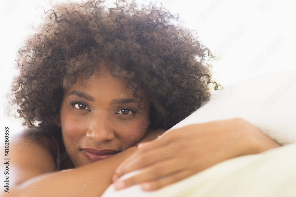 Portrait of woman lying on bed Portrait of woman lying on bed