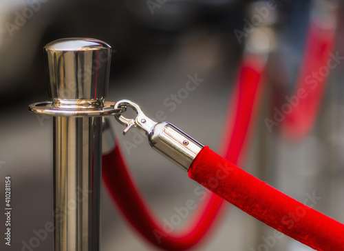 Red rope and stanchion photo