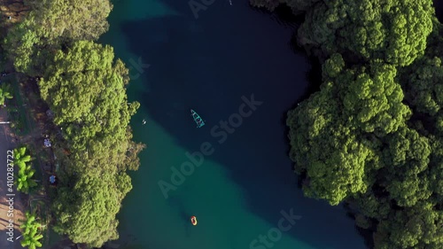 Aerial: people enjoying a day in the lake, drone view photo