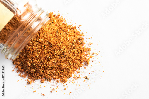 Fototapeta Naklejka Na Ścianę i Meble -  BBQ Rub Spilled from a Spice Jar