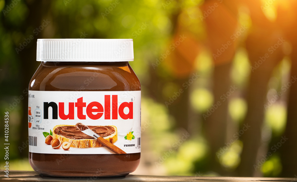 Pot of Nutella, the popular brand name of a sweetened hazelnut cocoa  spread, introduced to the market in 1964 by Italian company Ferrero who  celebrates 75 years anniversary in 2021 Stock Photo | Adobe Stock