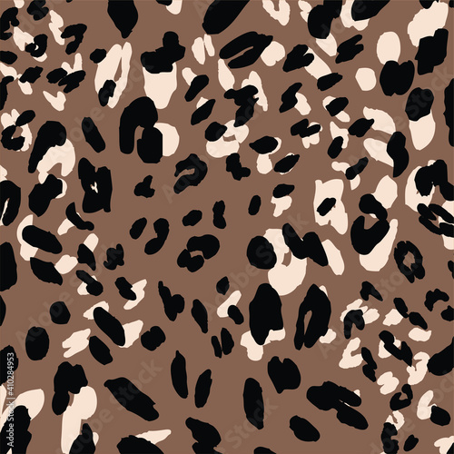 Abstract animal skin leopard seamless pattern design. Jaguar, leopard, cheetah, panther fur. Seamless camouflage background for fabric, textile, design, cover, wrapping.