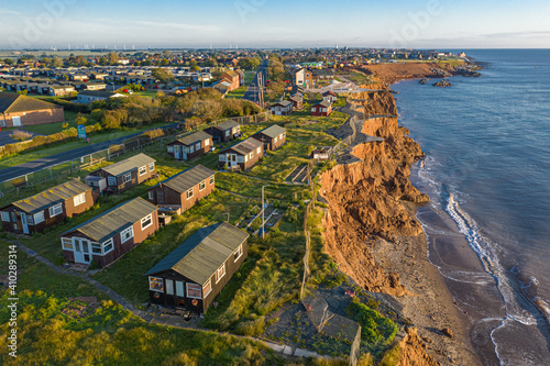 Aerial view of a small group of houses in Withernsea county coastline. United Kingdom. photo