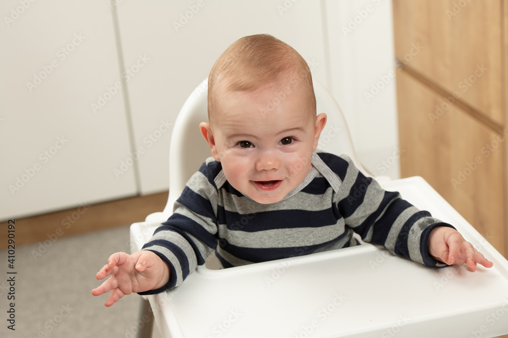 Baby Boy Sitting on Chair Waiting for Meal Baby Boy Sitting on Chair Waiting for Meal