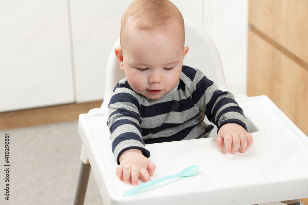 Baby Boy Sitting on Chair Waiting for Meal Baby Boy Sitting on Chair Waiting for Meal