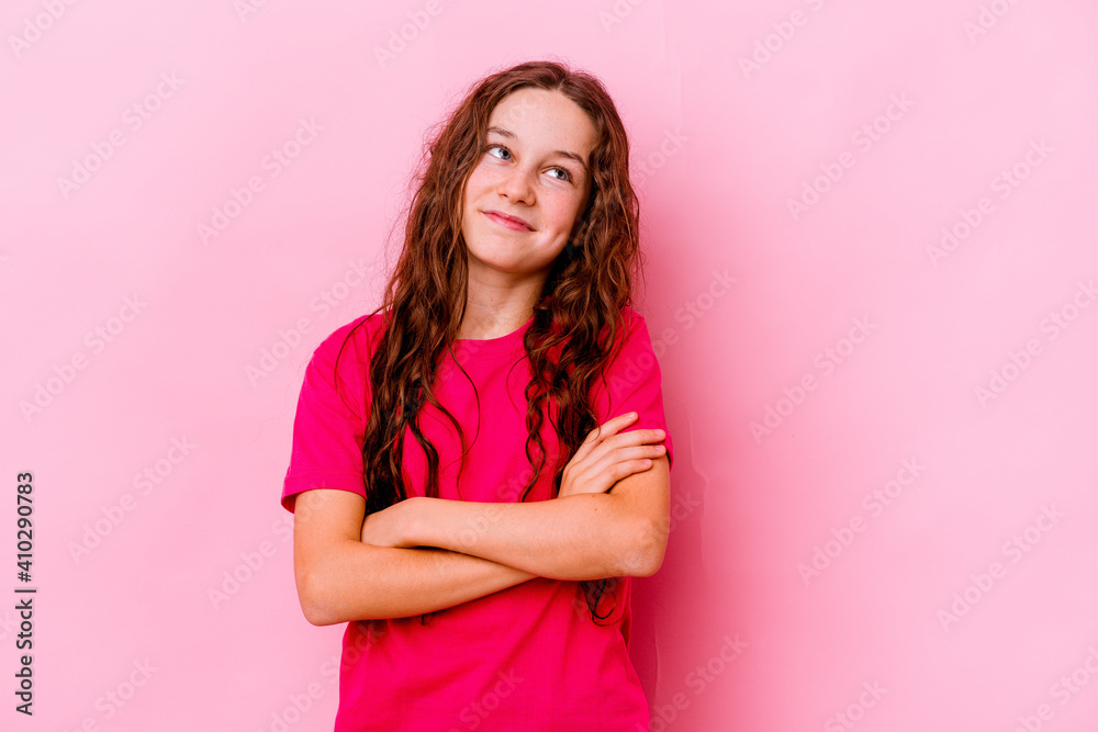 Little caucasian girl isolated on pink background dreaming of achieving goals and purposes Little caucasian girl isolated on pink background dreaming of achieving goals and purposes