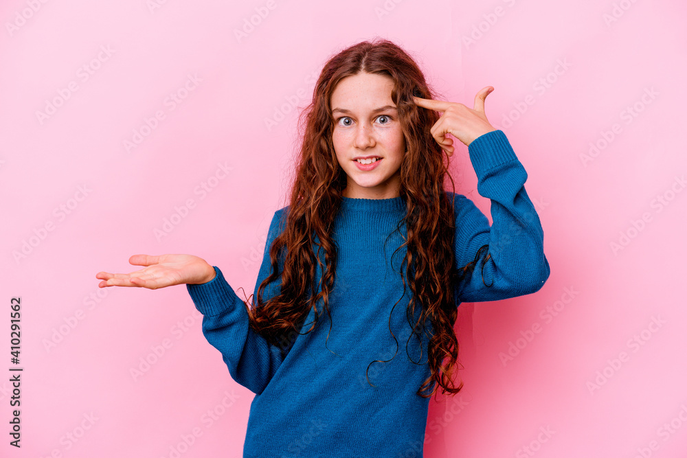 Little caucasian girl isolated on pink background showing a disappointment gesture with forefinger. - obrazy, fototapety, plakaty 