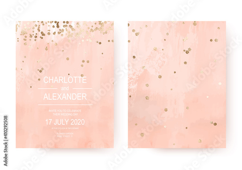 Peachy acrylic wedding invitation cards with gold border confetti.