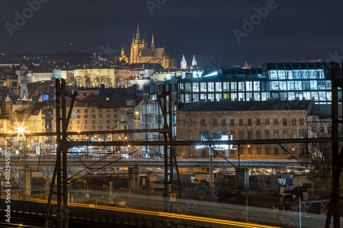 .view of the pillars on the modern cement railway bridge in the center of prague at night 2021