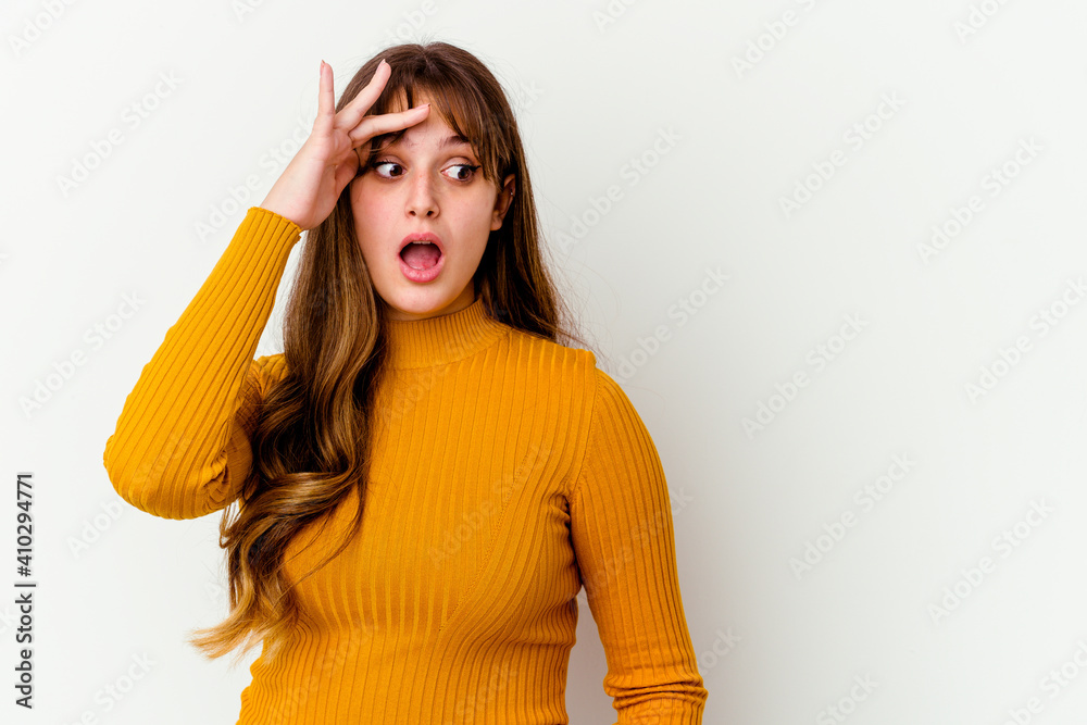 Young caucasian cute woman isolated on white background looking far away keeping hand on forehead. Young caucasian cute woman isolated on white background looking far away keeping hand on forehead.