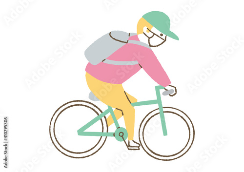 マスクをして自転車に乗る人