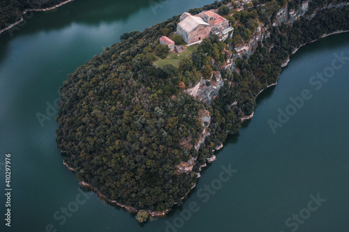 Aerial view of the Sant Pere de Casseres monastery along the Riu Ter river in Pyrenees. Vic, Spain. photo