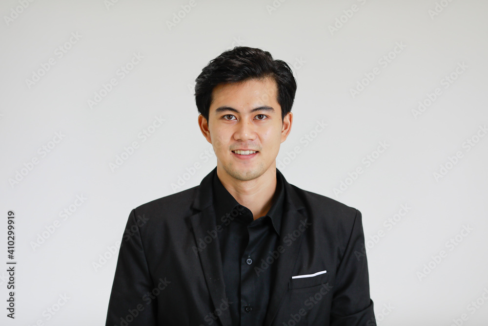 Portrait of young and handsome good looking Asian man on white background. Portrait of young and handsome good looking Asian man on white background.