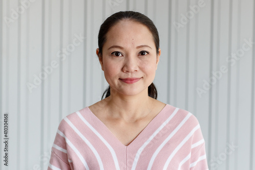 Portrait of a beauty smiling asian women, Closeup portrait of beautiful Asian woman on white background.