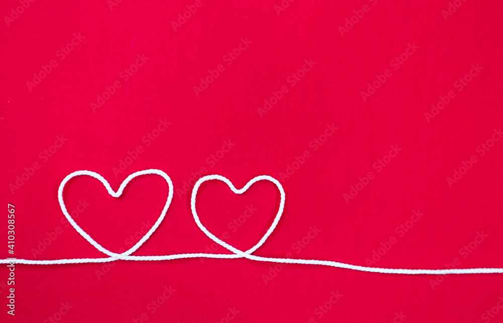 Valentine card background idea, two heart on red fabric background, love and romance symbol