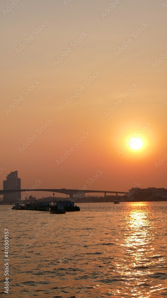 Beautiful landscape view from Chao Praya river during sunset, Bangkok, Thailand
