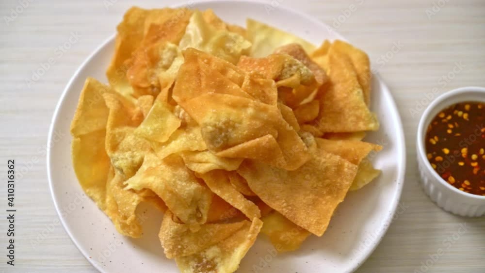 deep fried pork wonton with dipping sauce deep fried pork wonton with dipping sauce