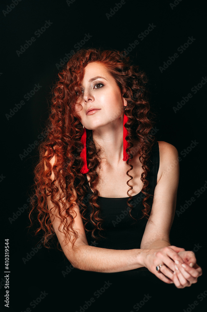 A girl with curly red hair A girl with curly red hair