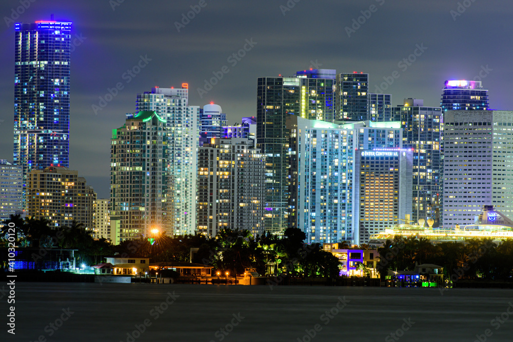 Miami business district, lights and reflections of the city lights. Miami night.