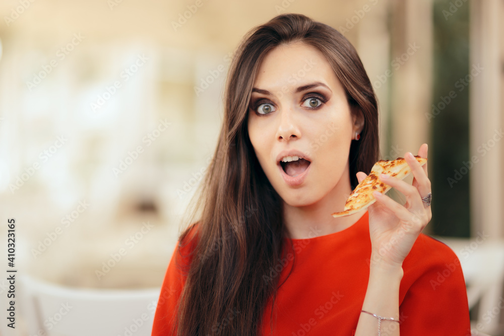 Funny Woman Eating a Pizza Slice in a Restaurant Funny Woman Eating a Pizza Slice in a Restaurant